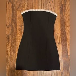 Edikted black mini dress
Size Small